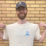 White tee shirt front with blue outlined Oberon sun. logo.