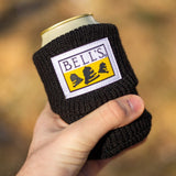 A black cotton beer sleeve with a white yellow, and black Bell's logo sewn onto it.