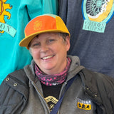 Five panel lightweight polyester cap with different colors for each panel.  Featuring a yellow bill, an orange front with yellow stitched Oberon sun and yellow side panels.  There are also two panels on the top, one being blue and the other teal.