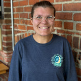 Navy Long Sleeve Tee with the Oberon Eclipse logo on the left chest. On the back the writing says "its polite to stare".