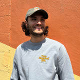 Light gray crewneck sweater with Two Hearted IPA in orange with green border on the left pocket area, and "Since 97" in small green print beneath