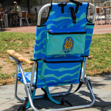 Blue beach chair with a sun design backpack on a patio