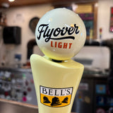 off white tap globe with Flyover Light text logo