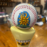 A tap handle globe with a baseball-like design featuring the Oberon brand logo in blue, orange, and yellow colors on a white background