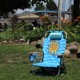 Blue beach chair with sun design and 'Oberon' branding on a grassy area.