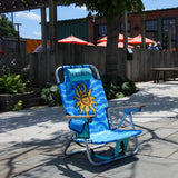 Blue beach chair with sun design and 'Oberon' branding on a patio with umbrellas in the background.