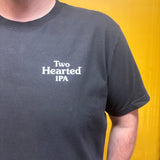 Front view of black tee shirt with Two Hearted IPA printed in white on the pocket area