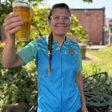 Women's cut shirt, front zipper, Tal sleeves strips into body of shirt, small Oberon chest logo.