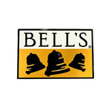 Horizontal tin sign of the black, white, and yellow Bell's logo