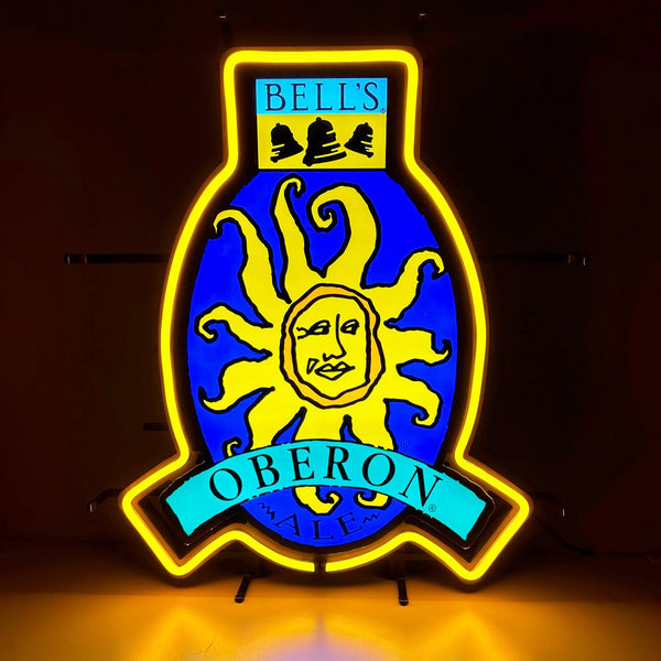 LED "Neon" sign of Oberon Ale logo. Royal Blue oval background with yellow Oberon Sun in the center. Teal oberon banner across the center bottom. Blue, yellow, and black Bell's logo at the center top. Yellow outline around entire sign.