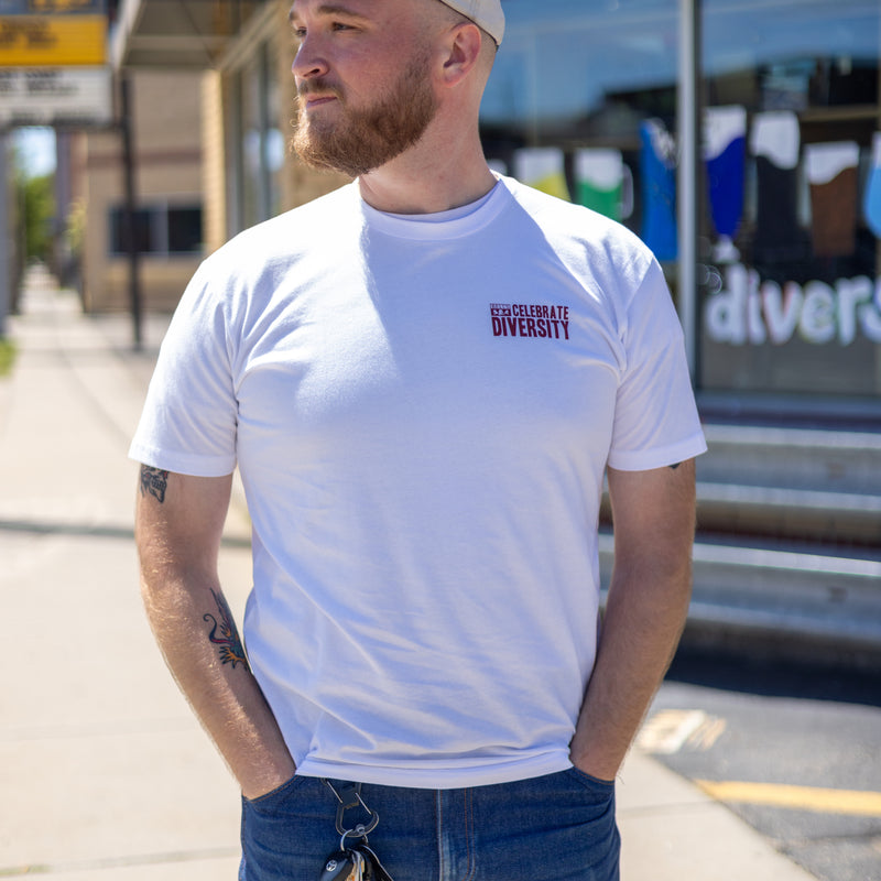 White tee shirt with maroon "Celebrate Diversity" on the pocket area, with a small maroon Bell's logo
