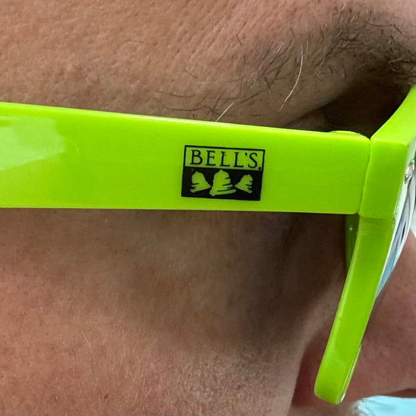Close up of Bell's logo on temple of sunglasses.