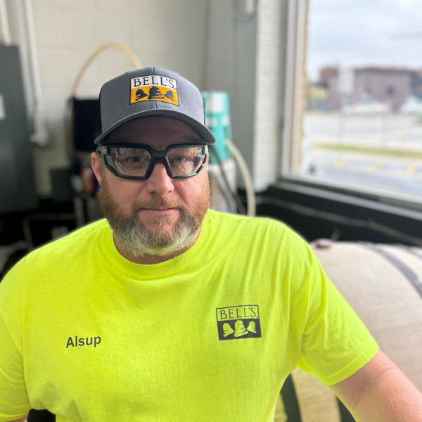 Charcoal front trucker hat with black net backing.  Full color Bell's logo embroidered patch on front.