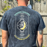 Short Sleeve Tee, Navy Acid Wash, with large logo on the back "Oberon Eclipse" at the top, Oberon Eclipse logo in the center and "Its Polite toe Stare: at the bottom. Oberon eclipse logo on the right chest pocket.