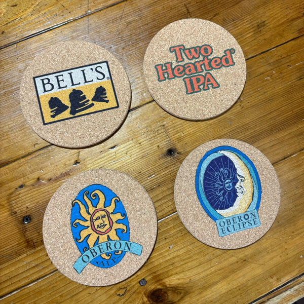 4 Cork Coasters, each with a different Bell’s logo. Bell’s Logo, Two Hearted, Oberon, and Oberon Eclipse