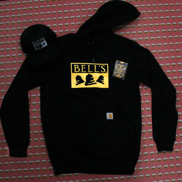 black Carhartt hoodie with yellow Bell's logo over the pocket.  Black trucker hat with gray logo, and one pack of Bell's branded Euchre card deck