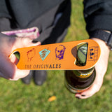 golden yellow paddle style bottle opener with Originales branding, featuring old Bell's logos