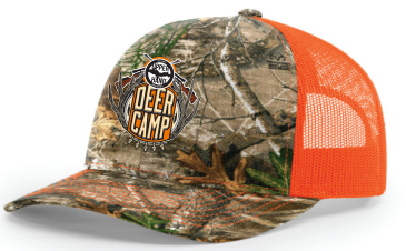 A cotton twill trucker cap with an orange mesh back panel and structured flat brim. The front panel and brim are a realistic camp design with 'Deer Camp' logo embroidered patch in the front center.