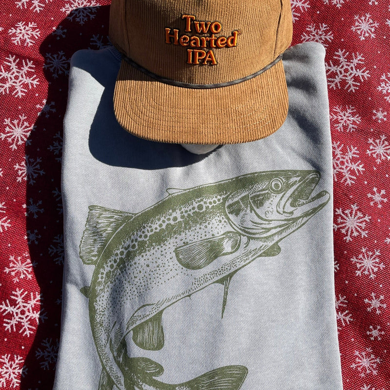 back of Gray Two Hearted crewneck sweater, with a large trout image in green across the back.  also features a brown corduroy hat with "Two Hearted IPA" embroidered in orange with green outline