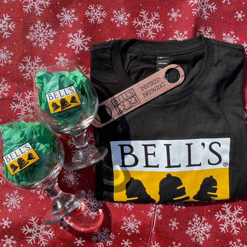 2 glass Bell's full color logo snifters, 1 black t shirt with full color Bell's logo, and 1 copper paddle style bottle opener with Bell's logo