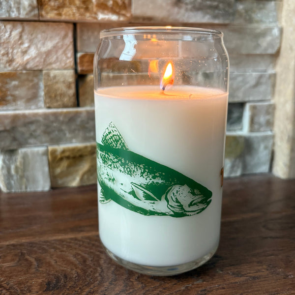 backside of can glass white candle with Two Hearted IPA brand fish in green