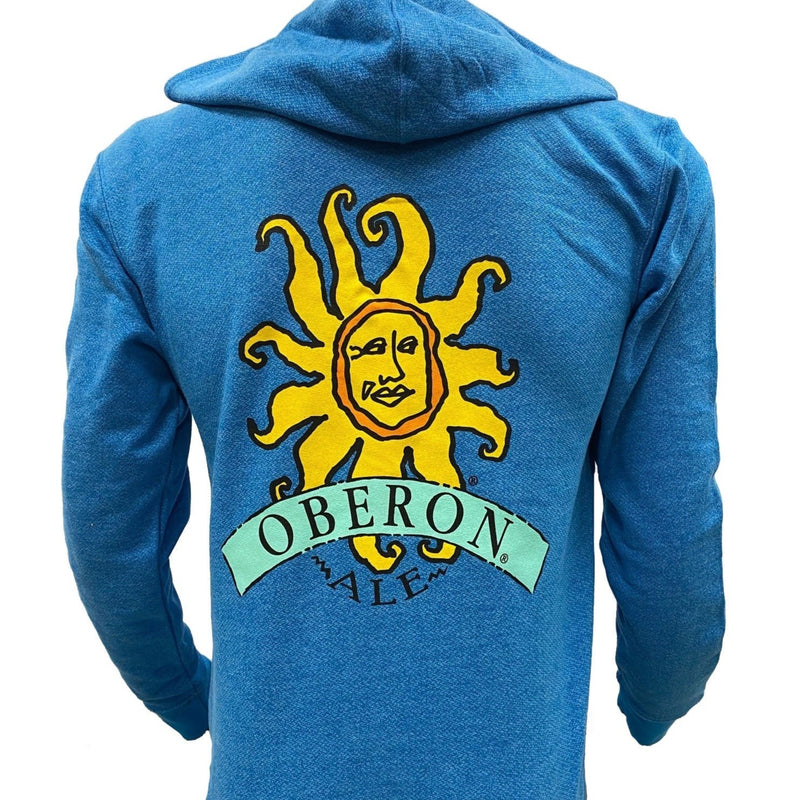 Heathered turquoise zip up hoodie with full color Oberon logo on the back, with small blue Bell's logo on the front left pocket. 