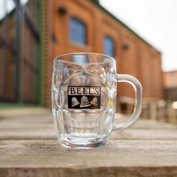 clear glass dimple mug with  Bell's logo printed on front in black