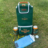 tall and slim green cooler bag with white zipper and accents, and orange handle.  Branded with Bell's logo on magnetic flap, and orange trout on middle with Two Hearted IPA in orange text