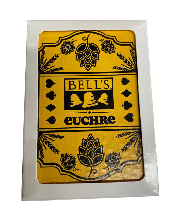 Pack of a deck of cards. Features a yellow card with black printing of Bell's logo, euchre, and barley and hops illustrations.