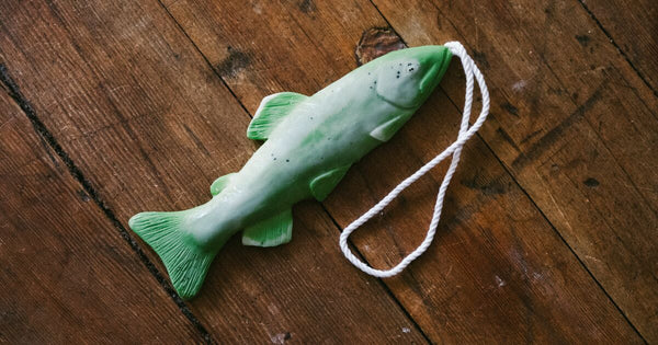 Green  Two Hearted brand trout shaped soap on a rope