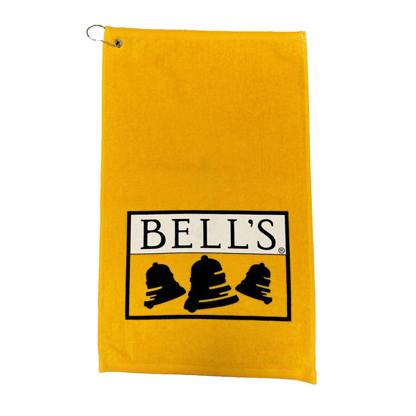 Golden yellow golf towel with Bell's Logo and Inspired Brewing printed on it.