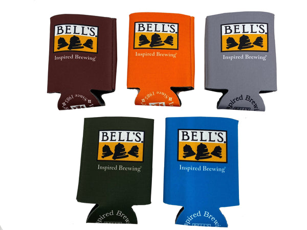 5 fabric can sleeves atop a white background. Colors include brown, orange, gray, dark green, and blue. The Bell's logo and the words "inspired brewing" live on the front of the sleeve, and "inspired brewing since 1985" and the Bell's logo live on the bottom of the sleeve.