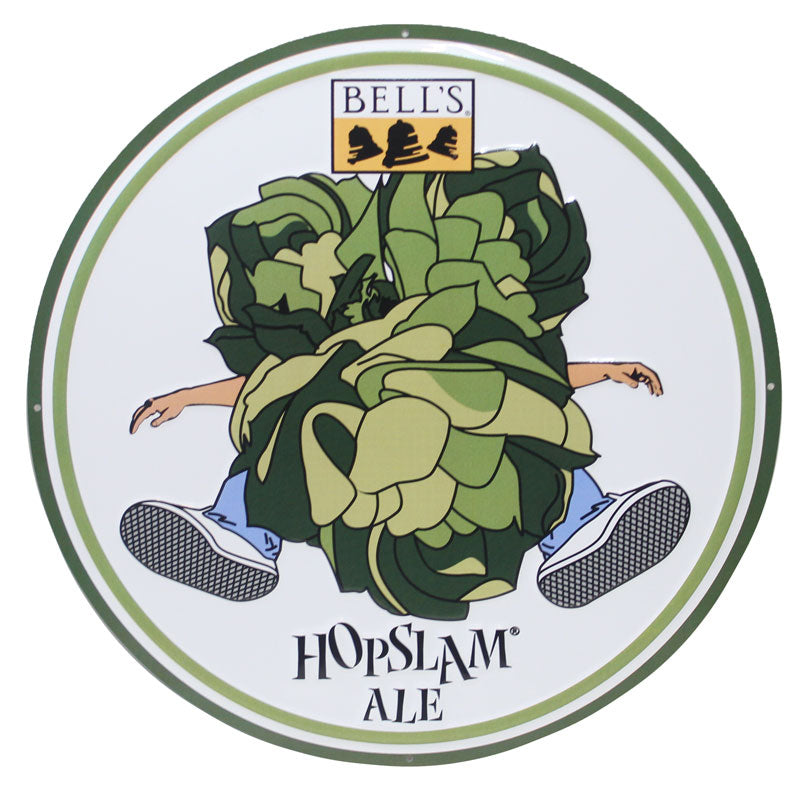 Round sign with green borders, the Bell's Brewery logo on top, illustration of 3 hop plants slamming into a person with their arms and legs sticking out, and the Hopslam Ale logo underneath.