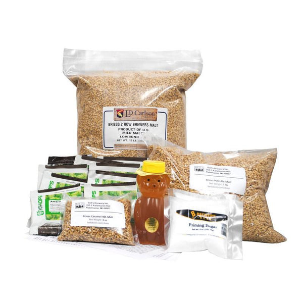 Kit ingredients including malt, hops, priming sugar, and honey