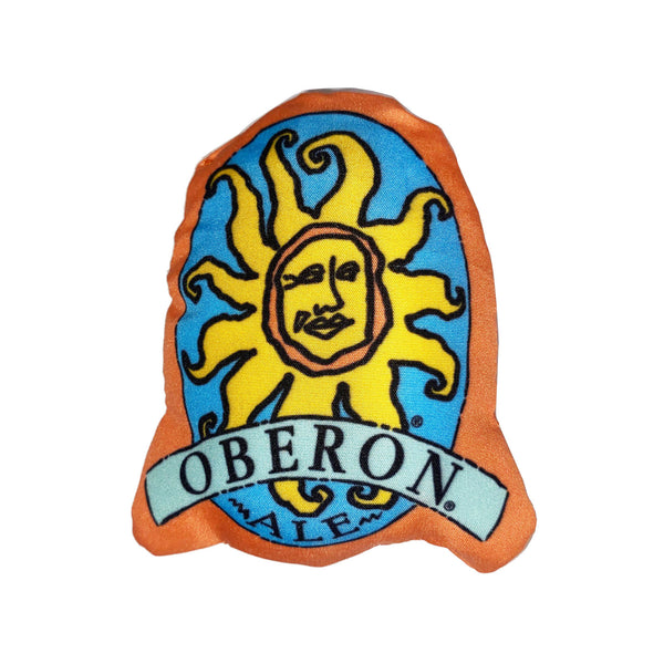 Orange plushie with the Oberon Ale logo screen printed on it