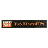 Black bar rail mat with bell texture. Features yellow, black, and white logo on the left and "Two Hearted IPA" in orange on the right.
