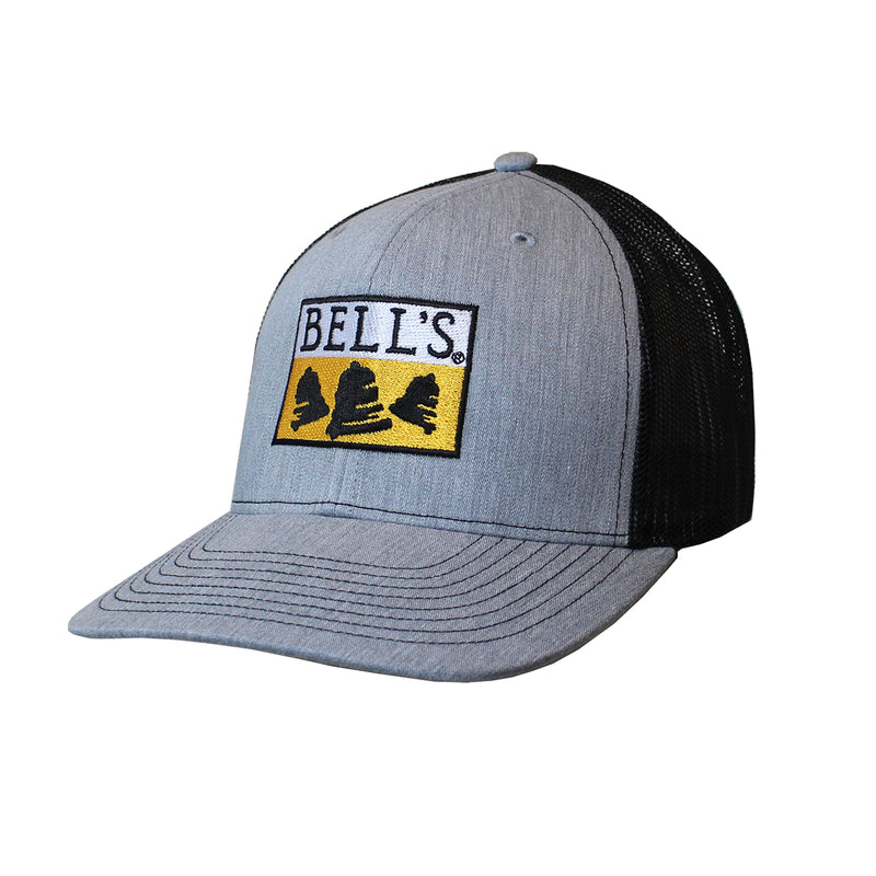 Baseball cap with heather grey twill front and brim, and mesh black back. Features black, white, and yellow Bell's embroidered logo on the front.